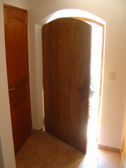 Door to laundry room on the left, main door on the right