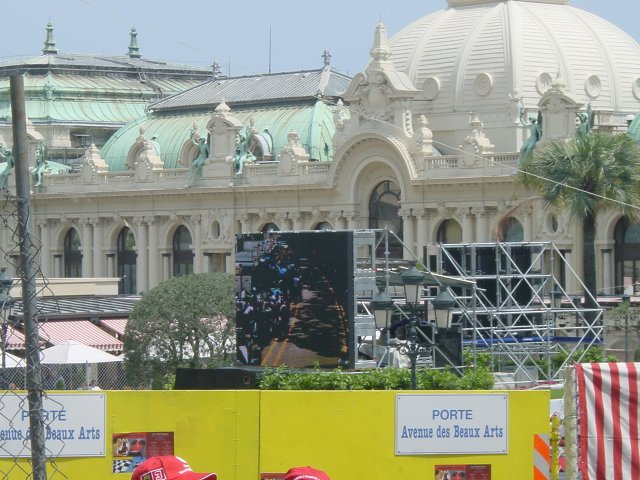 Wide screen showing a passing racing car