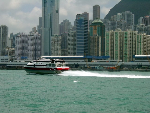 Hovercraft speeding in front of HK island