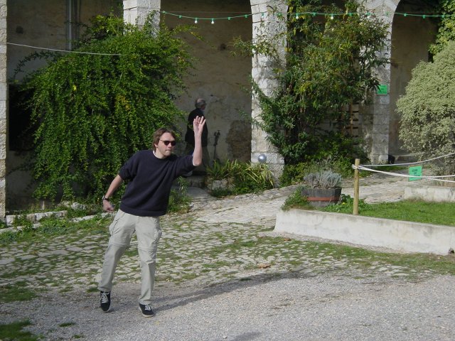 Maxf throwing, a frown on his face