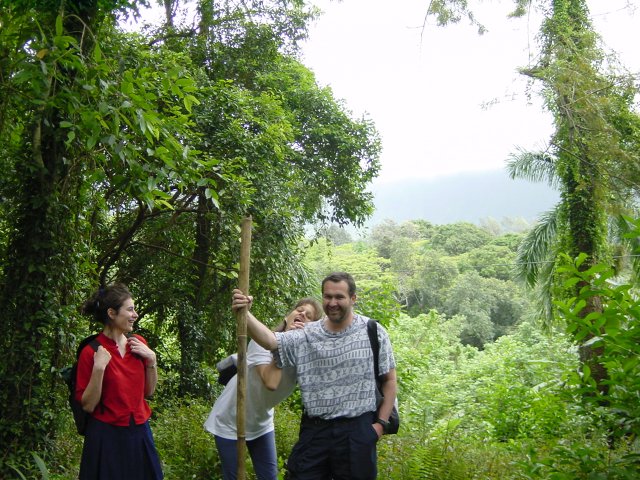 Christelle, Caroline, Daniel holding a stick