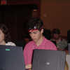 Carine and Olivier in front of their laptops