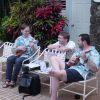 'Les troubadours': Jose and Daniel playing their Ukulele, Max in the middle 