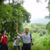 Christelle, Caroline, Daniel holding a stick