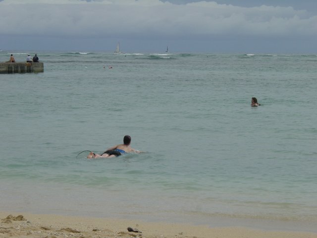 Female surfer at sea