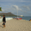 Surfer on the sand, Diamond Head in the background