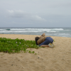 Caroline crouching to take a picture