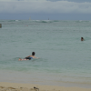 Female surfer at sea