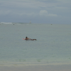 Female surfer at sea
