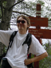 Max standing in front of the 'Pont des Tuves' sign and pointing the other direction