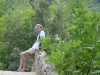 Philipp sitting on the edge of the bridge