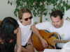 Wendy and Max singing, Daniel singing and playing the guitar