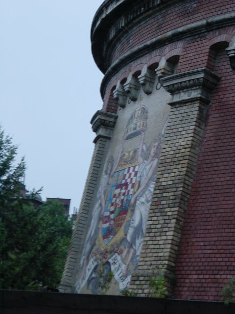 Coat of arms on the wall next to the funicular