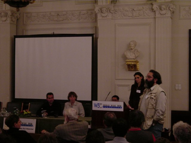 Ivan answers the question, Daniel, Marie and Eva at the front of the room