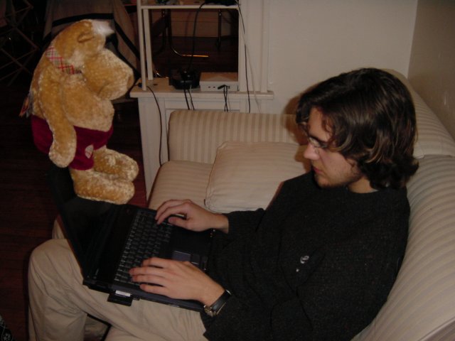 Henri geeking with Rudolfo sitting on his screen