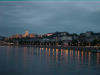 Dinner cruise on the Danube: bridge, lights, castle, twilight