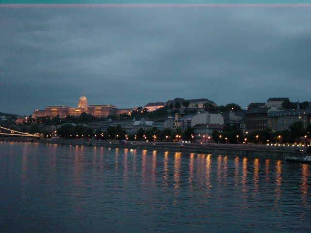 Dinner cruise on the Danube: bridge, lights, castle, twilight