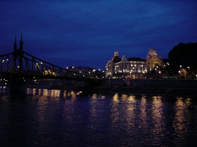 Twilight on the Dinner Cruise: bridge, water, illuminated building