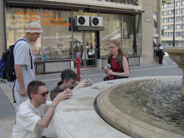 Max and Danbri taking a picture of a fountain, Dean and Nicole