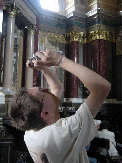 Max taking a picture of the ceiling