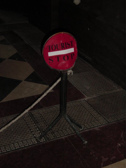 "tourist stop" red sign with ropes