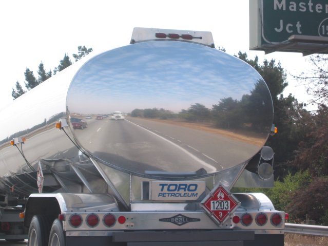 Mirror reflection in a truck shiny tank