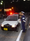 The singer gets a fine near the police car