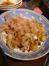Food (potatoes and thin slices of dry fish)