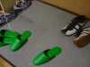 Karl's and my shoes next to the ryokan slippers