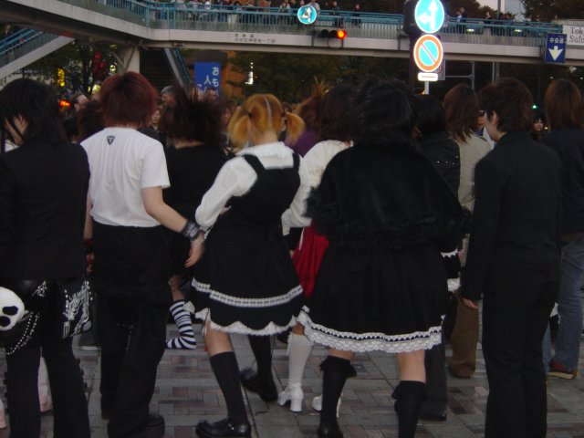 People dancing along the rock n' roll music