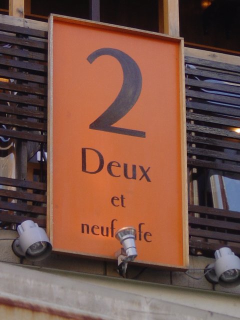 Sign reading "2 Deux et neuf cafe"