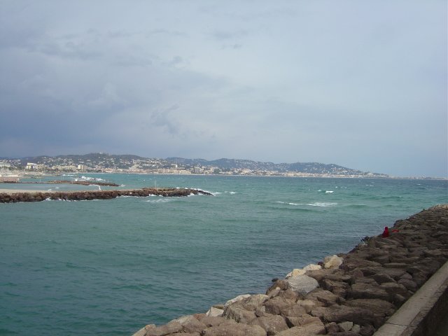 The river going into the Mediterraneant, Cannes in the background