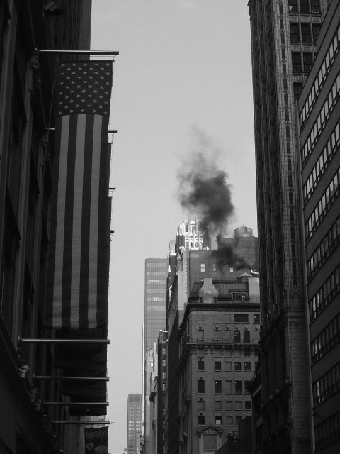 American vertical flags and black smoke 