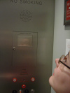 Amy and her reflection in elevator
