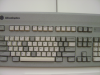 Keyboard (dangling next to an office door) arranged with names of occupants