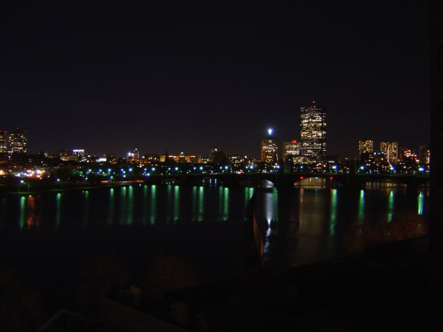 View from my room at night: the Charles River, reflections of lights and buildings