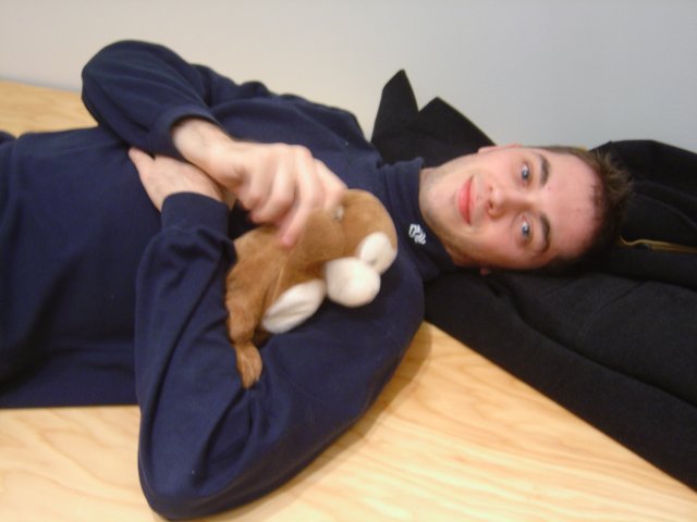 Olivier lying a bit and holding my monkey