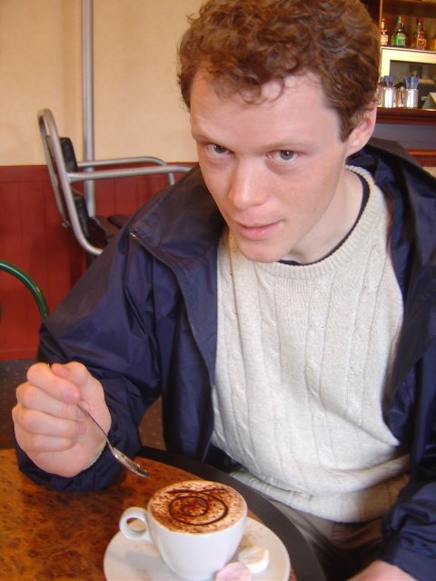 Joel having hot cocoa