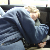 Joel sleeping at the back of the car
