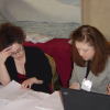 Amy van der Hiel and Susan Westhaver working at the registration desk, Hyatt Harborside, Boston