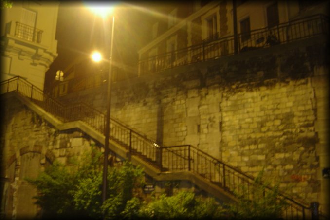Night photo: Stairs, street light, brick walls, shrubberies