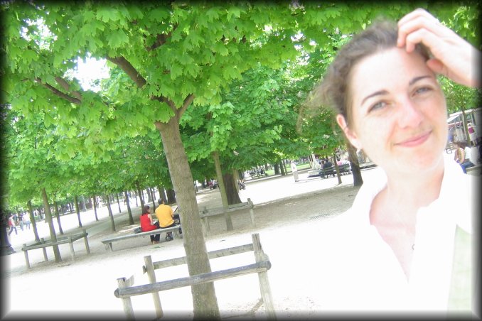 overexposure: woman in red, man in yellow, green trees, coralie in white