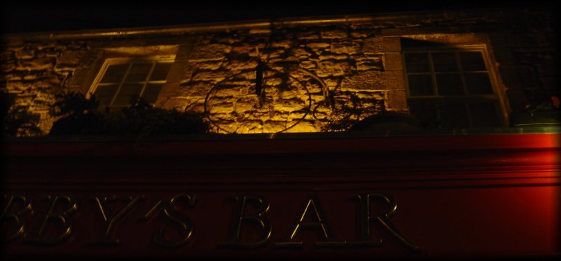 Bicycle on the brick wall above the Greyfriars' Bobby's bar