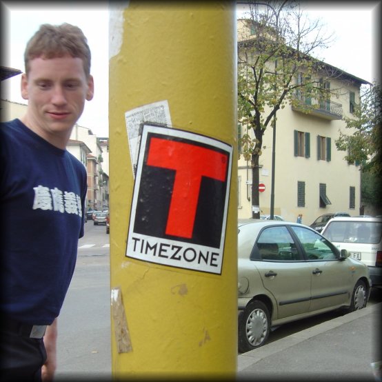 ericP next to a post, "Timezone" sticker