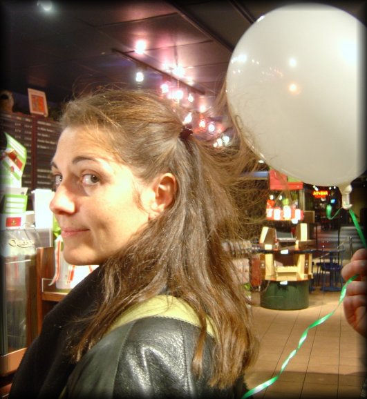 Me bored and amused and the same time that ericP played with my hair and this balloon forever