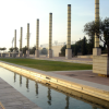 The Olympic Games ground, columns reflected in water.