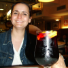 It's sangria o'clock. Isabelle is beaming in front of her glass.