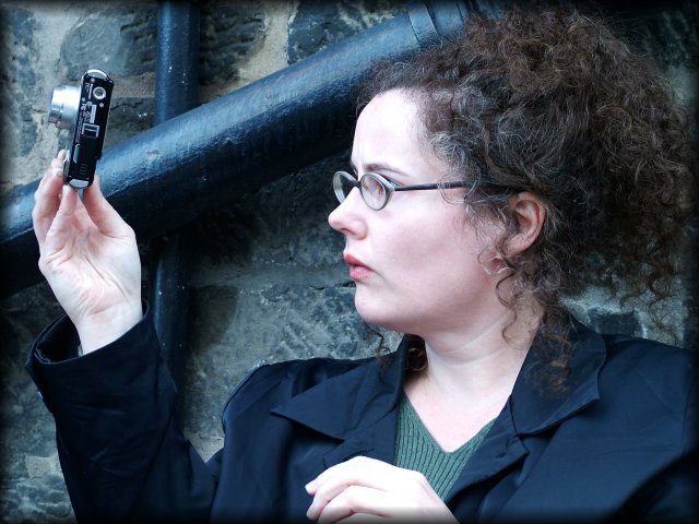 Sitting at the terrace of Maxie's near Grassmarket. Amy taking a photo. This is serious business ;)