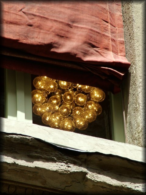 A window and the sun within the room.