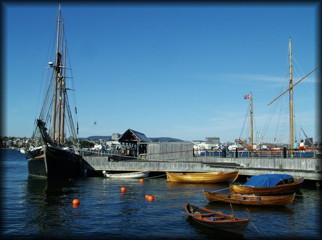Sailing ship and rowboats in the Oslo Fjord, at Bygdoy.